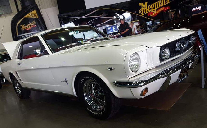 Classic Ford Mustang displayed at automotive show